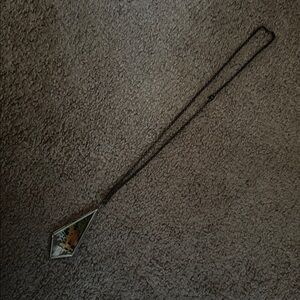 Peacock feather necklace.